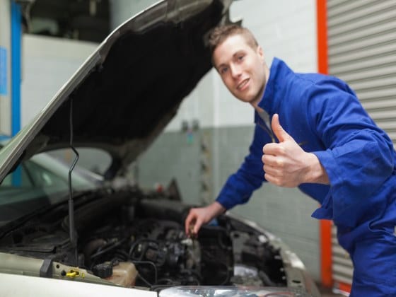 man changing oil in reno